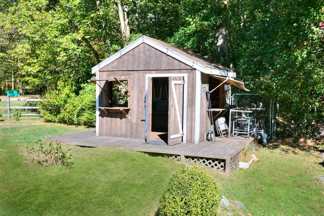 a view of a chairs and table in the patio