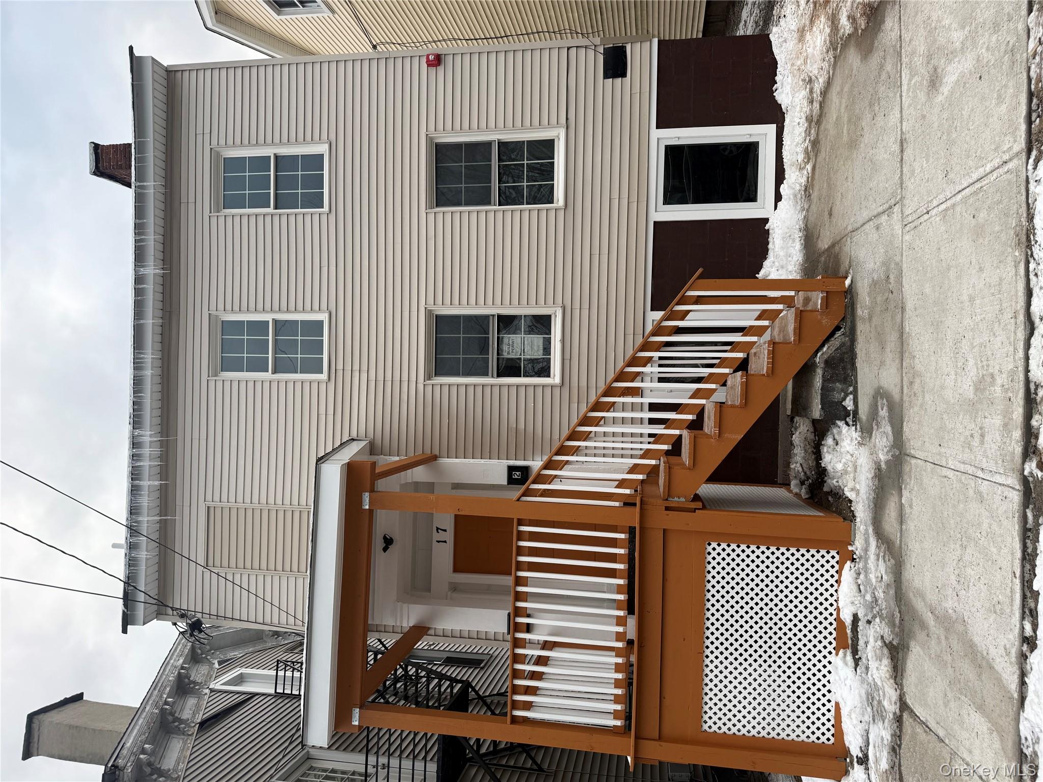 17 Conklin Street, Unit 1 Poughkeepsie, NY 12601 - Photo 1 of 17 Snow covered house with a chimney