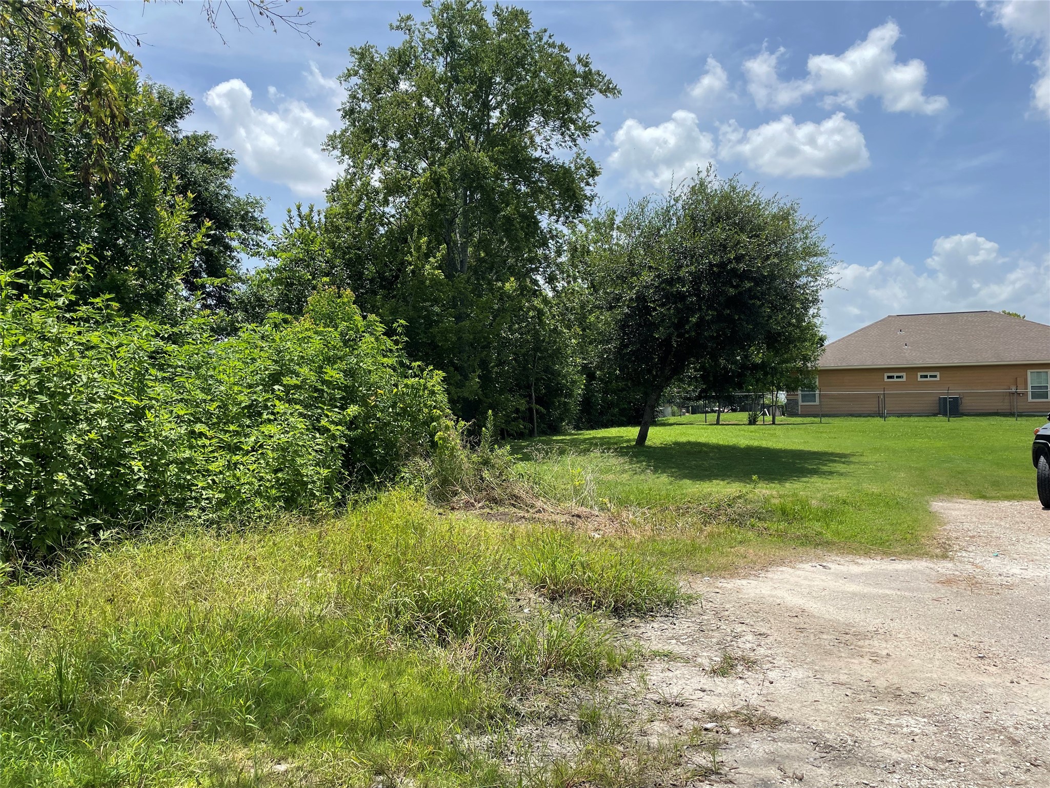 0 Doreen Street Rosharon, TX 77583 - Photo 4 of 24 a view of a house with a yard