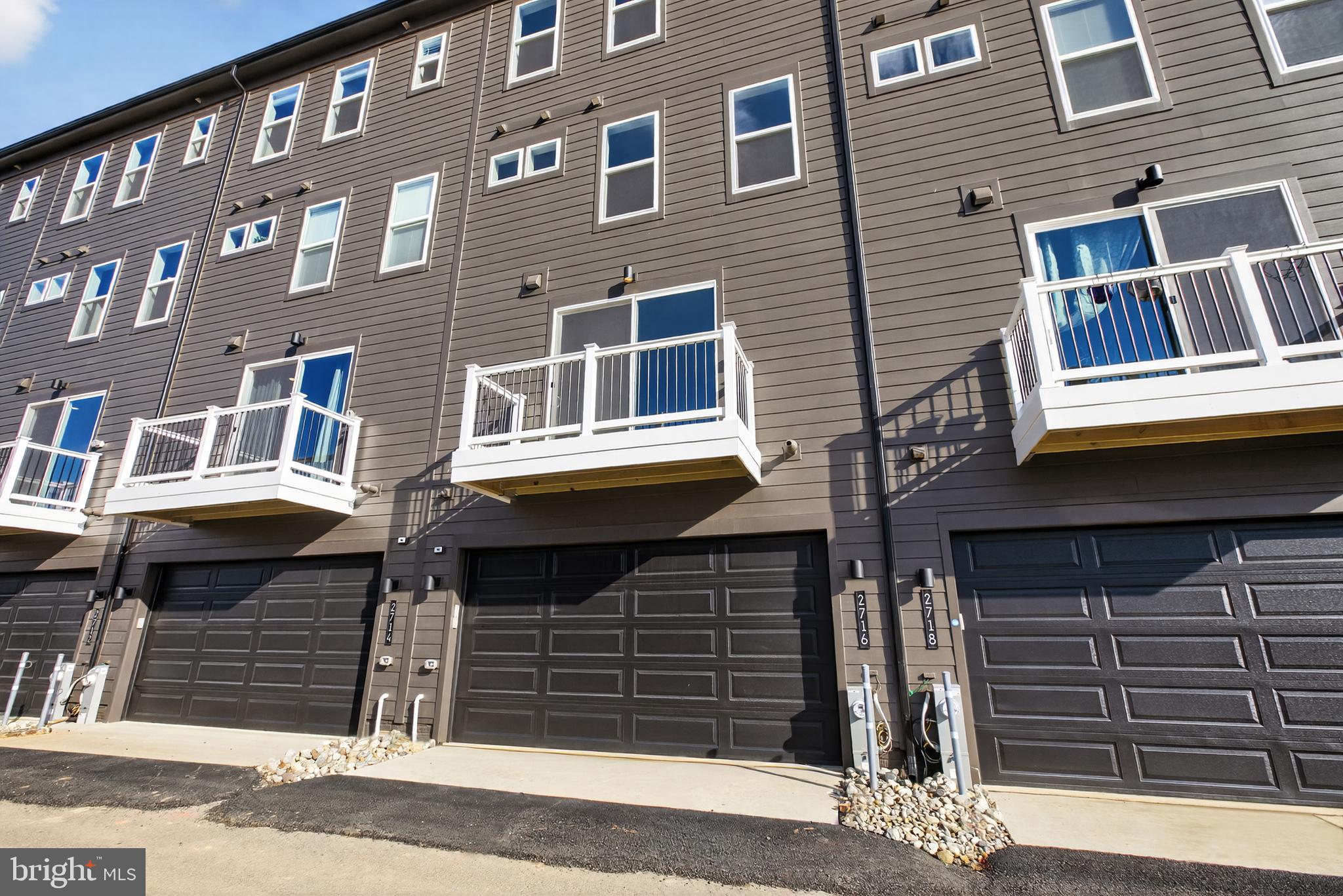 2716 Light Street Baltimore, MD 21230 - Photo 20 of 20 a front view of a building with a street