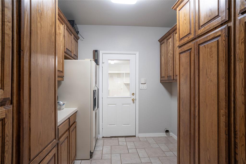 250 Timberleaf Drive Double Oak, TX 75077 - Photo 13 of 26 Large Laundry Room
