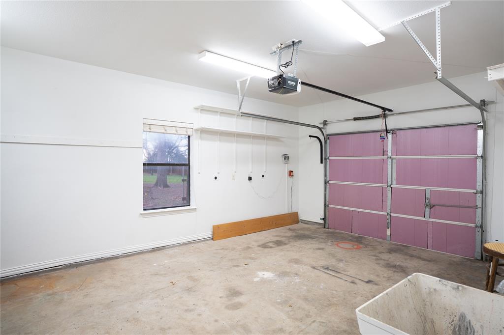 250 Timberleaf Drive Double Oak, TX 75077 - Photo 26 of 26 Oversized 3rd Garage Space