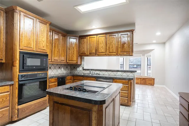 $5,000 | 250 Timberleaf Drive, Double Oak, TX 75077