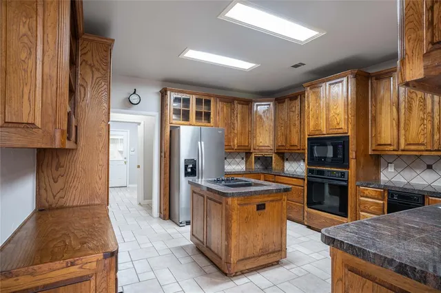 $5,000 | 250 Timberleaf Drive, Double Oak, TX 75077