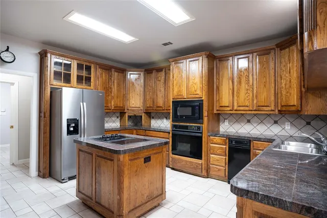 $5,000 | 250 Timberleaf Drive, Double Oak, TX 75077