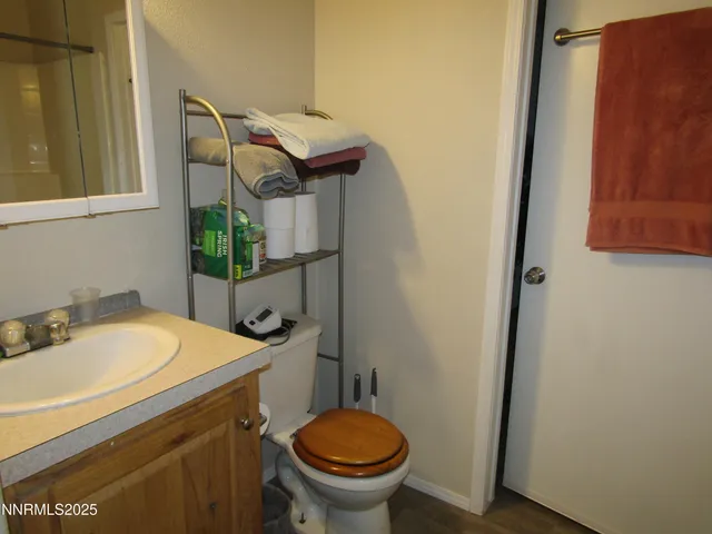 a bathroom with a sink and toilet