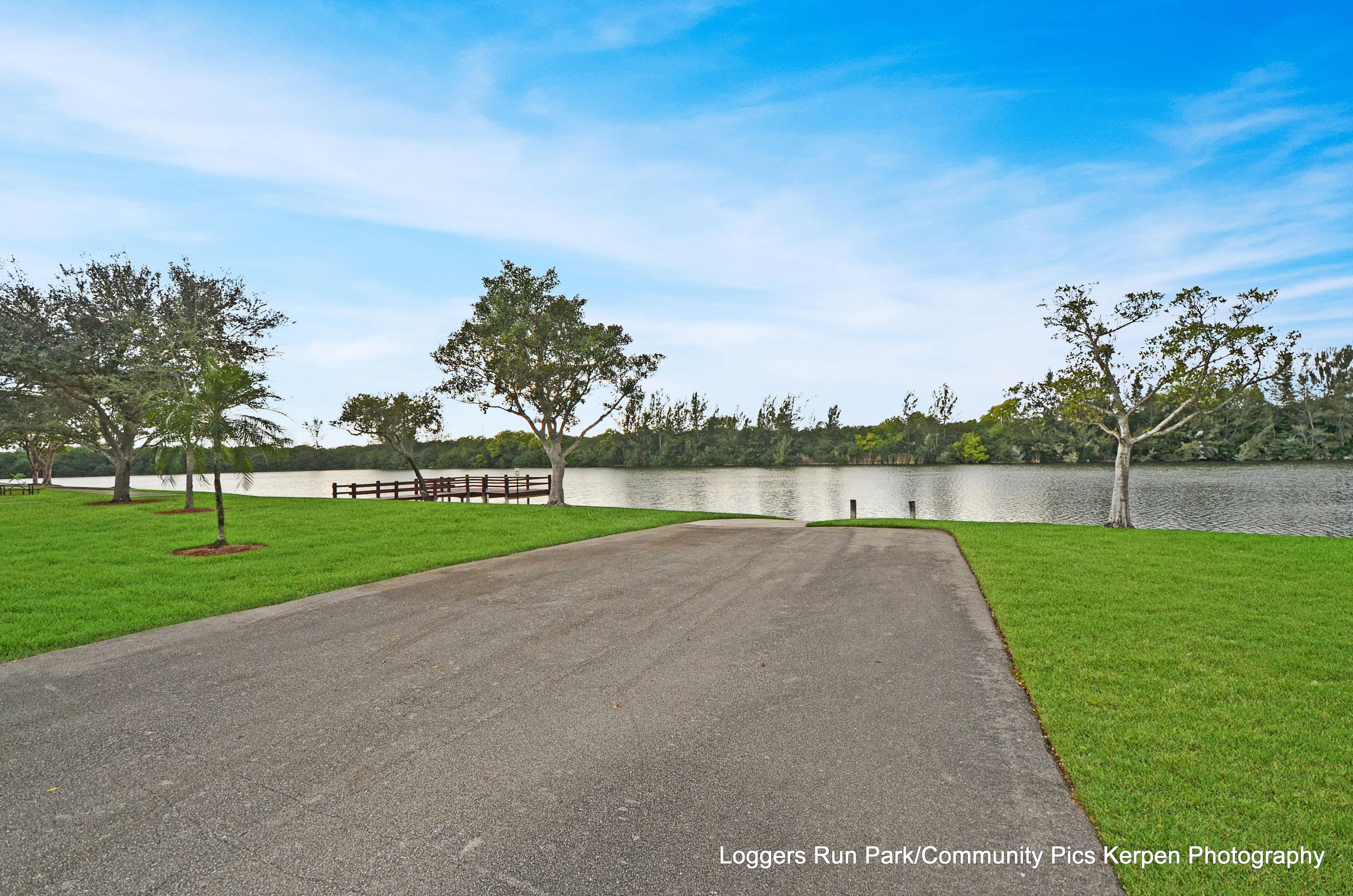 11682 Springflower Place Boca Raton, FL 33428 - Photo 62 of 66 a view of a park and trees in the background