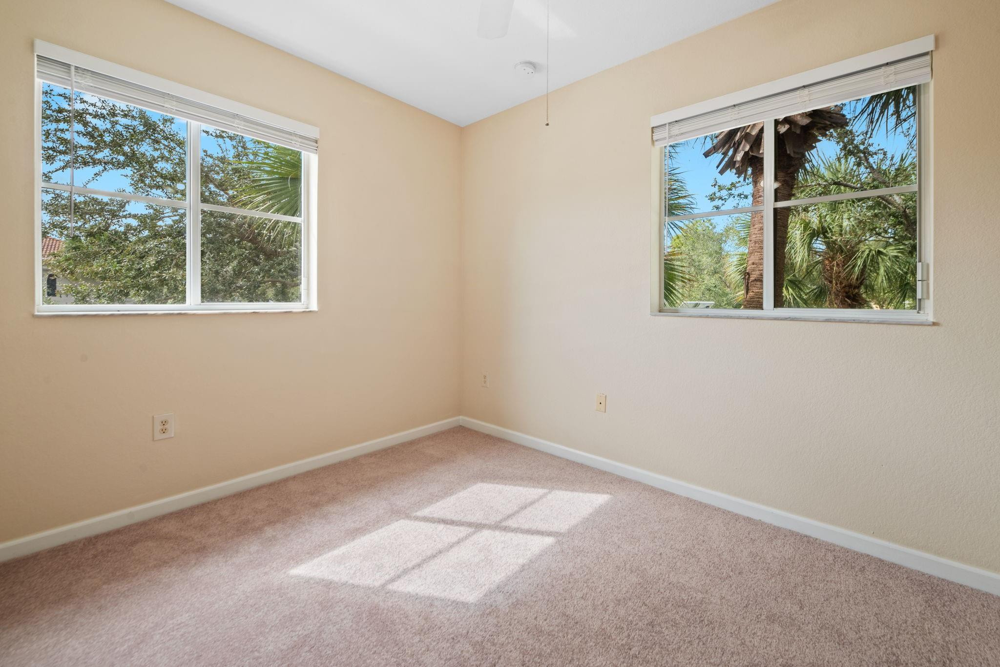 8299 Southwest 27th Street, Unit 101 Miramar, FL 33025 - Photo 16 of 30 an empty room with a window