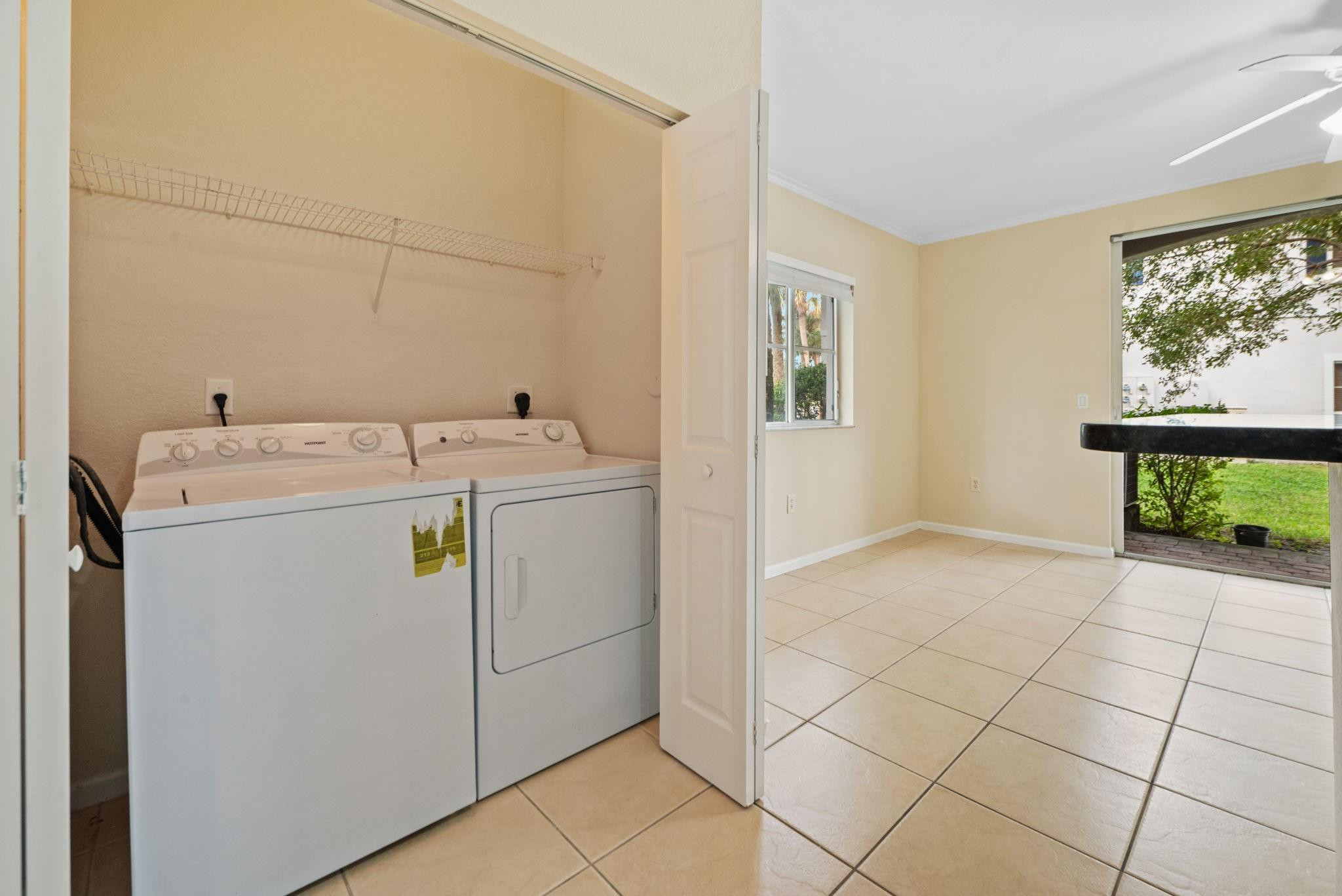 8299 Southwest 27th Street, Unit 101 Miramar, FL 33025 - Photo 21 of 30 a utility room with dryer and washer