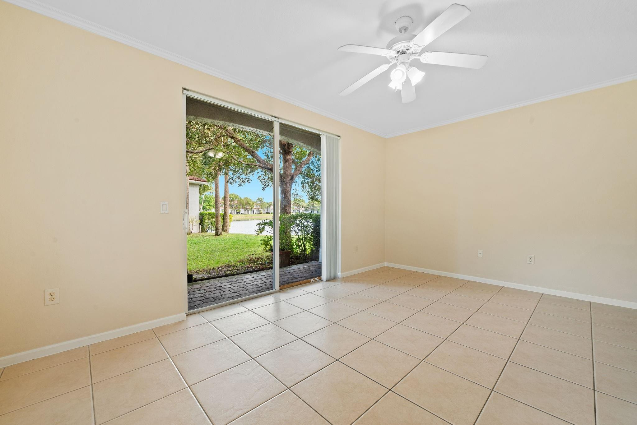 8299 Southwest 27th Street, Unit 101 Miramar, FL 33025 - Photo 6 of 30 an empty room with windows