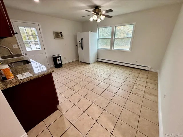 a view of a livingroom with a window