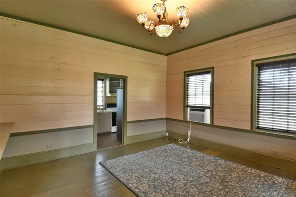 a view of a room with a chandelier