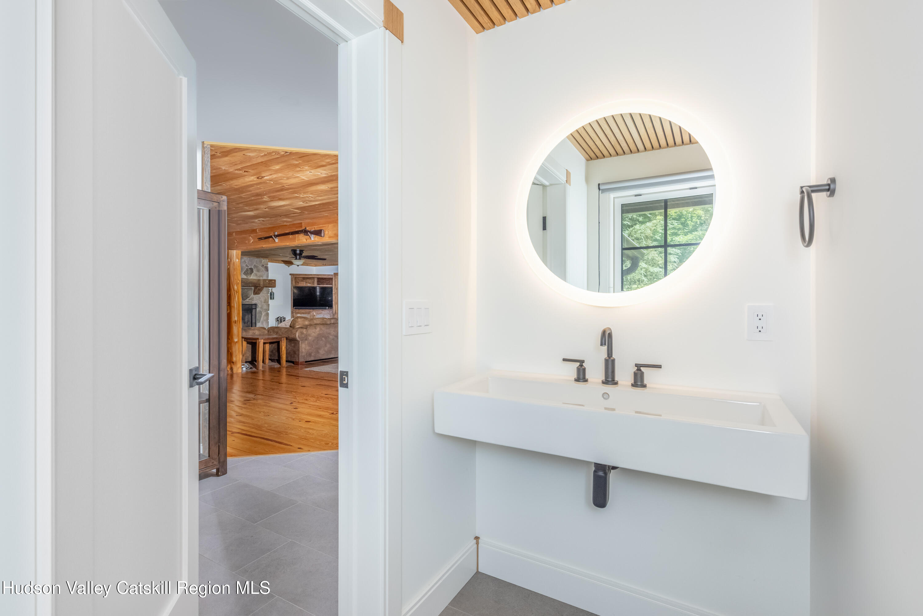 688 Bruce Porn Road Gilboa, NY 12167 - Photo 60 of 104 a bathroom with a sink and a mirror