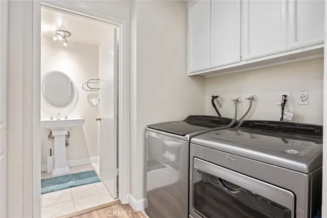 a view of a kitchen with sink stove and chair