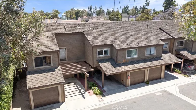 a aerial view of a house with a terrace
