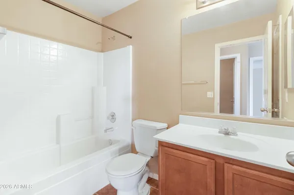 a bathroom with a sink a toilet and a bathtub