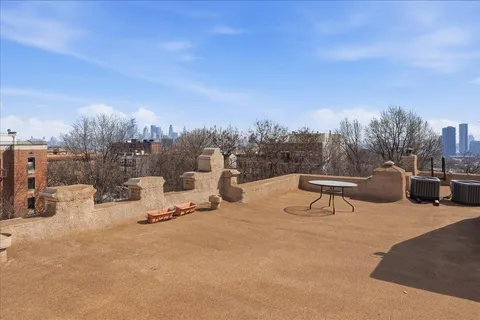 a view of a terrace with sitting area