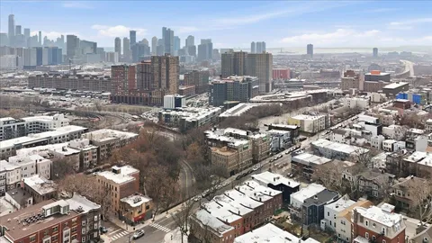 a large building with a city view