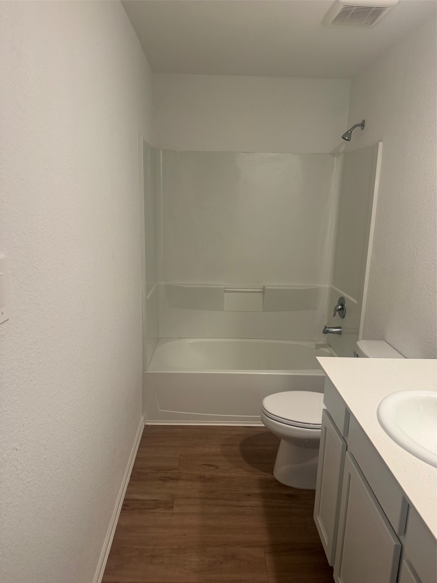 3202 Holly Stokes Way Conroe, TX 77301 - Photo 24 of 24 a bathroom with a sink a toilet and shower