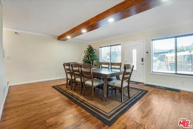 a spacious bathroom with double vanity and a mirror