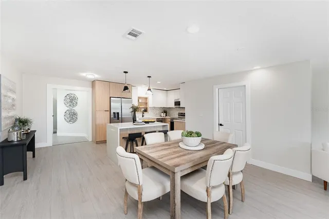 a view of a dining room with furniture