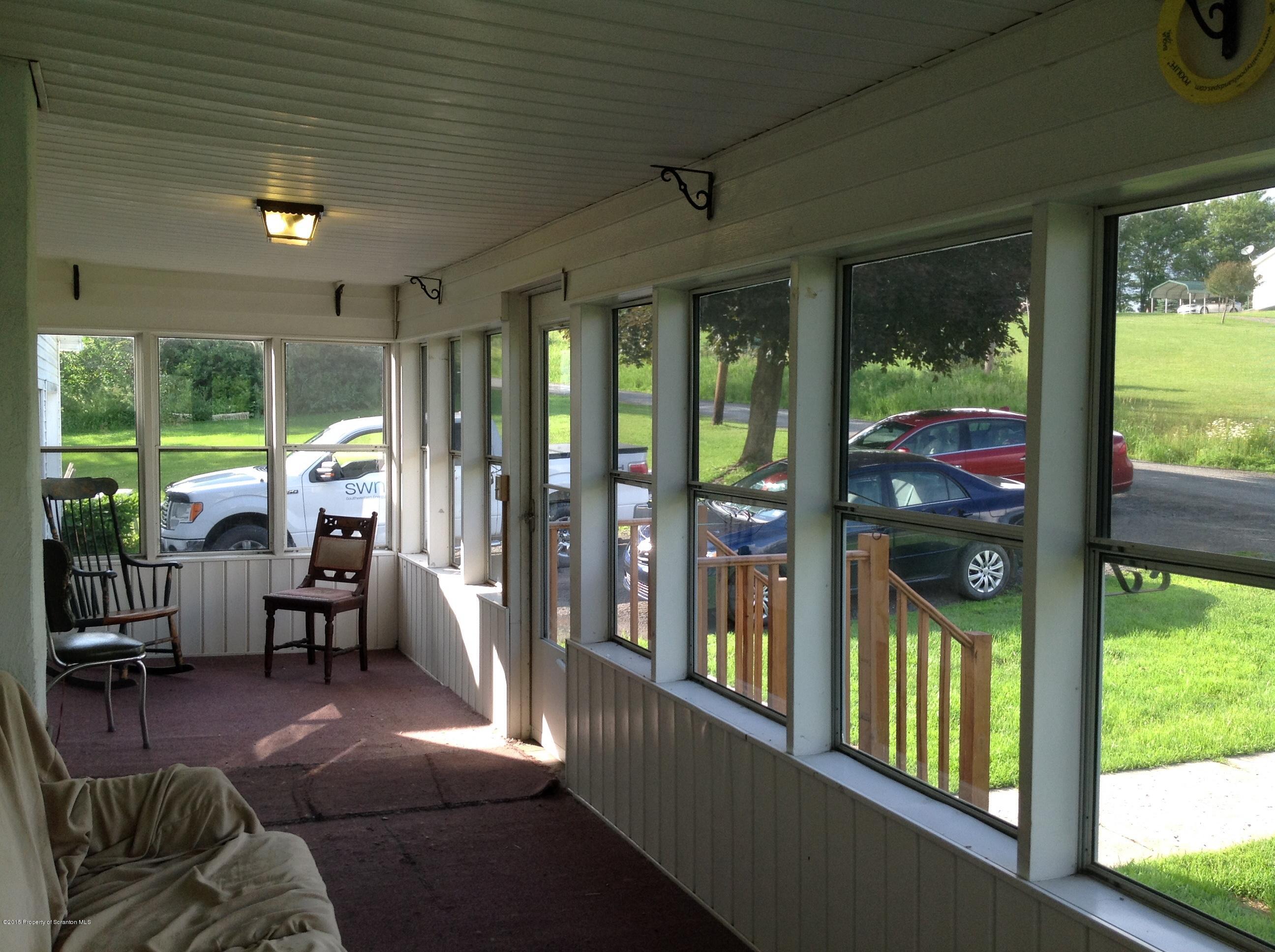 754 Squier Hill Road Nicholson, PA 18446 - Photo 18 of 39 Enclosed Front Porch