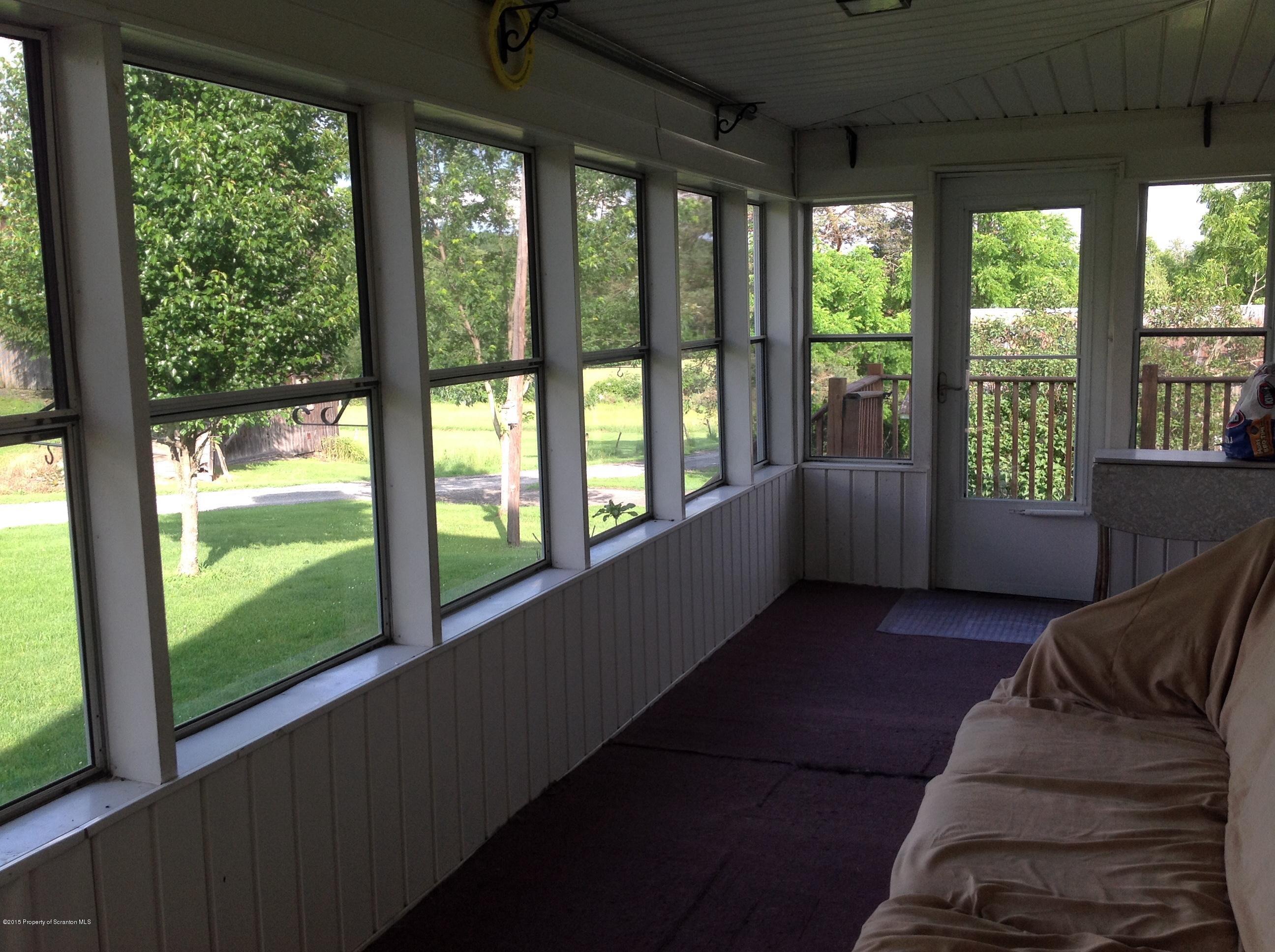 754 Squier Hill Road Nicholson, PA 18446 - Photo 19 of 39 Enclosed Porch