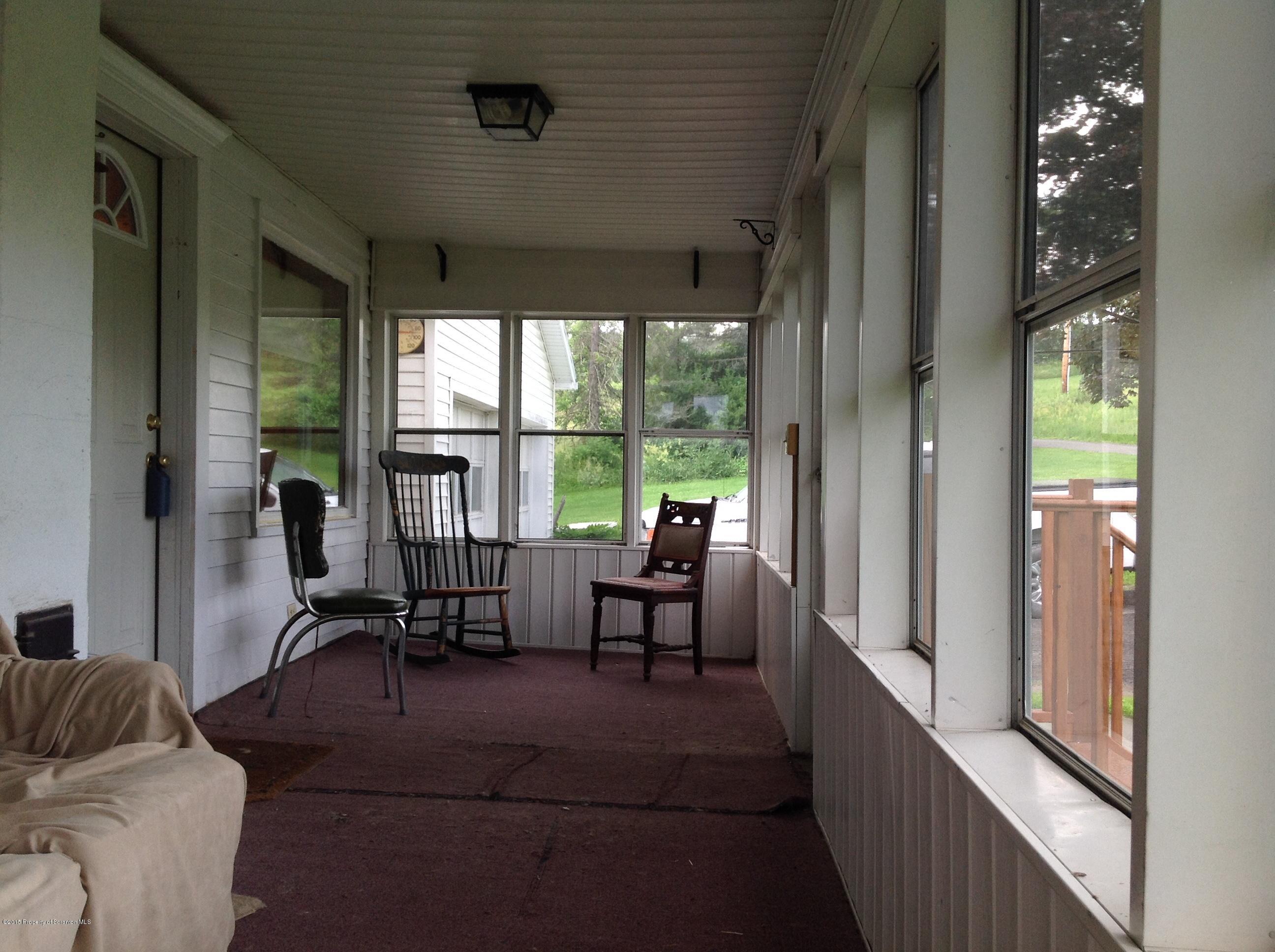 754 Squier Hill Road Nicholson, PA 18446 - Photo 20 of 39 Enclosed Porch