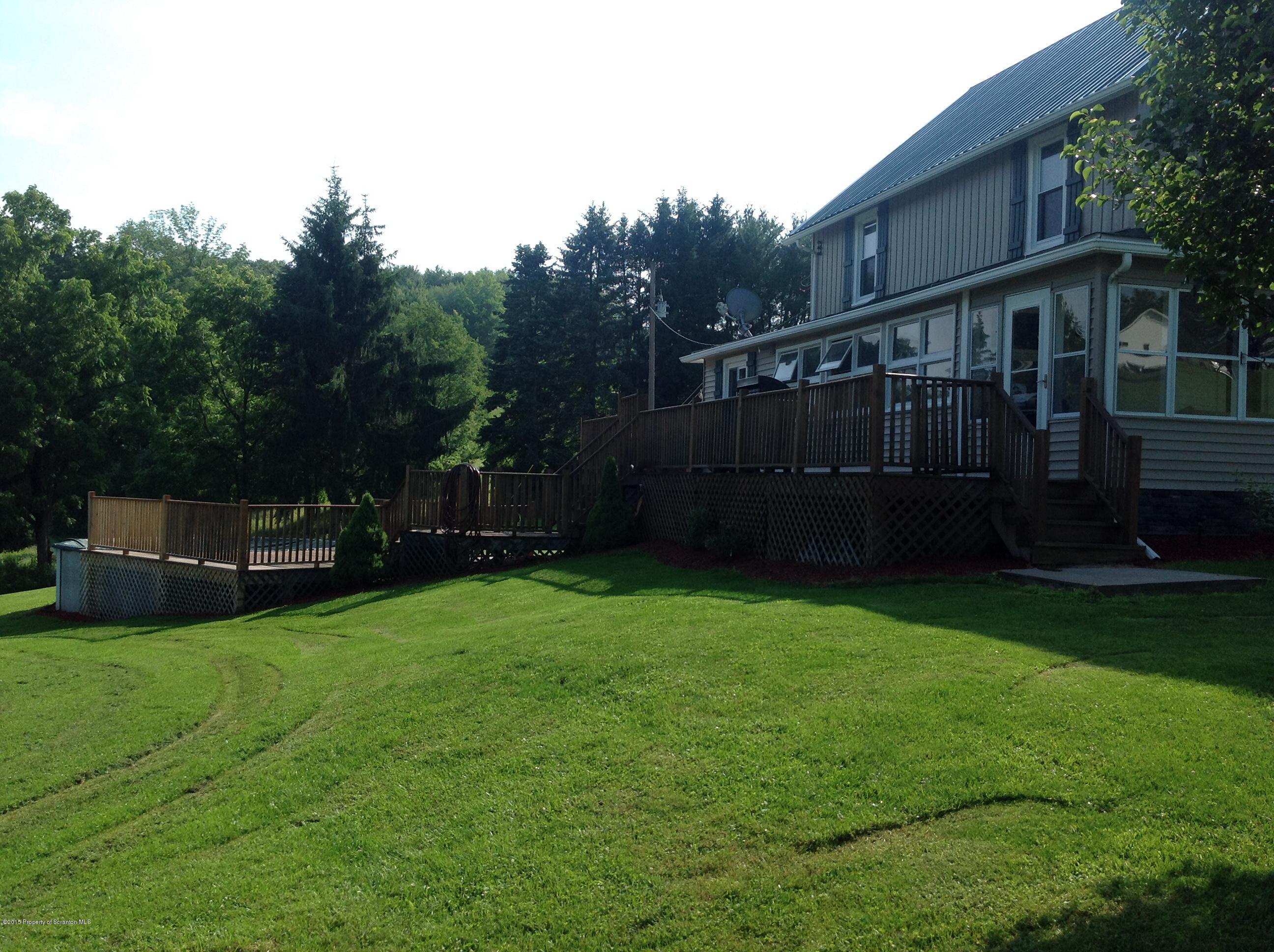 754 Squier Hill Road Nicholson, PA 18446 - Photo 4 of 39 Side
