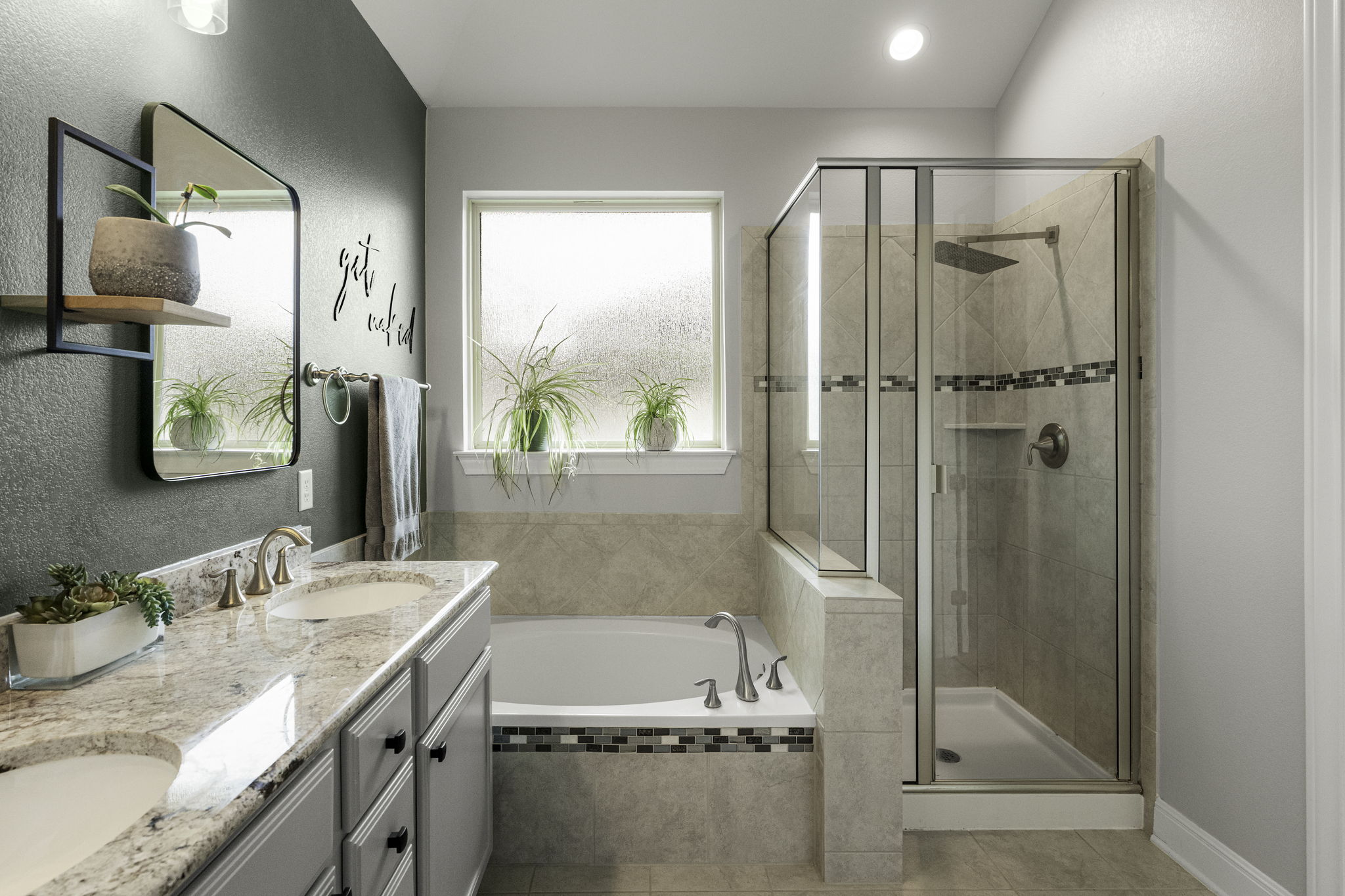 772 Founders Ridge Dripping Springs, TX 78620 - Photo 22 of 40 The primary bathroom features a
spacious walk-in closet, dual vanities, a soaking tub, and a
separate walk-in shower.