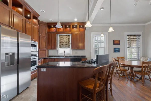 a kitchen with granite countertop lots of counter top space