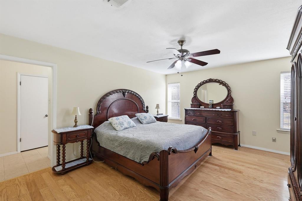 11436 Ridgeview Circle Fort Worth, TX 76244 - Photo 12 of 33 Large primary bedroom with ceiling fan