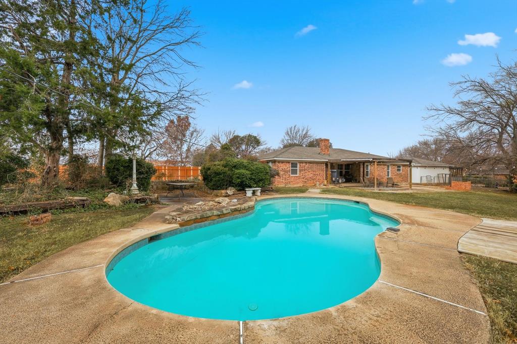 11436 Ridgeview Circle Fort Worth, TX 76244 - Photo 19 of 33 a view of a house with swimming pool