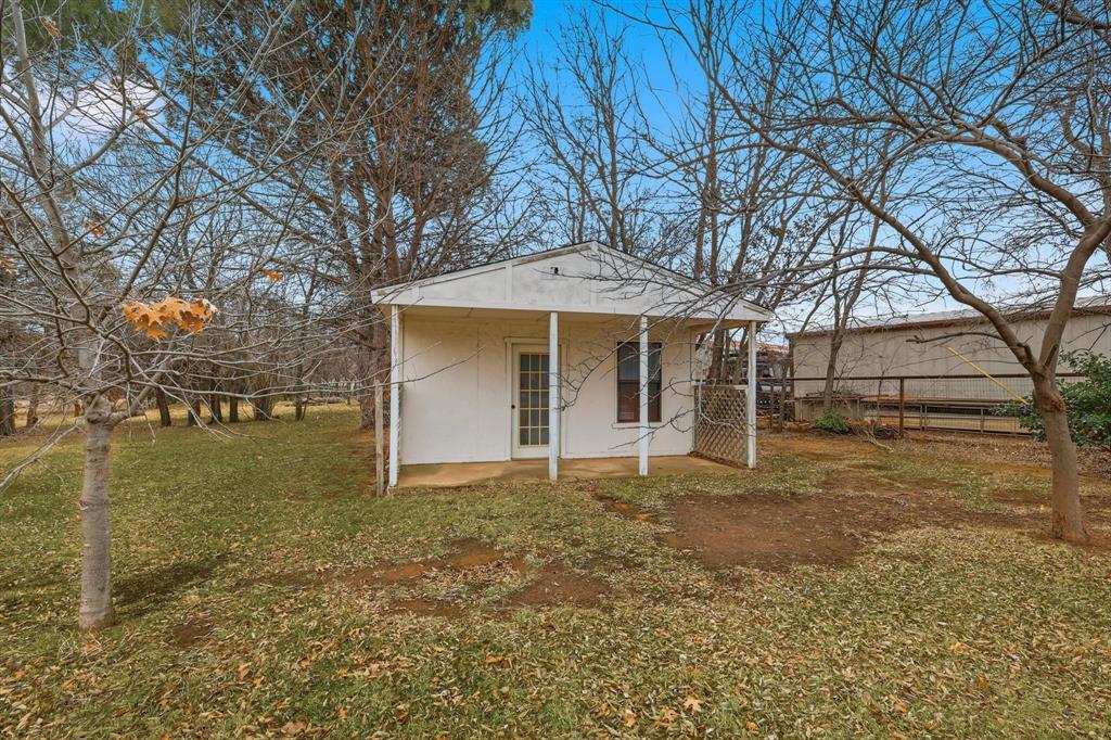 11436 Ridgeview Circle Fort Worth, TX 76244 - Photo 20 of 33 a view of a house with a yard