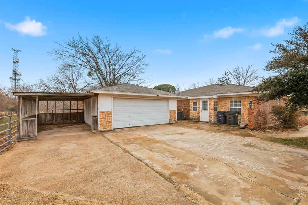 11436 Ridgeview Circle Fort Worth, TX 76244 - Photo 3 of 33 a view of house with outdoor space and trees in the background