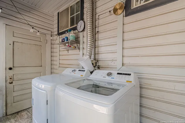 a utility room with dryer and washer