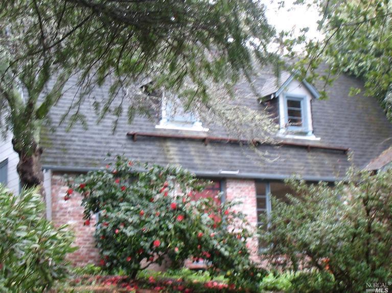 6070-6072 Fredricks Road Sebastopol, CA 95472 - Photo 1 of 1 front view of a house with a tree