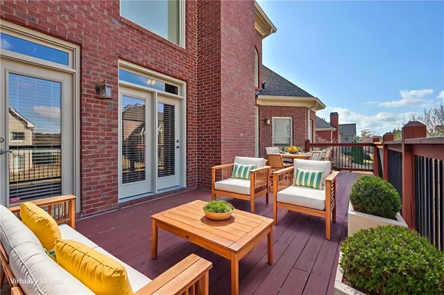 a backyard of a house with seating space