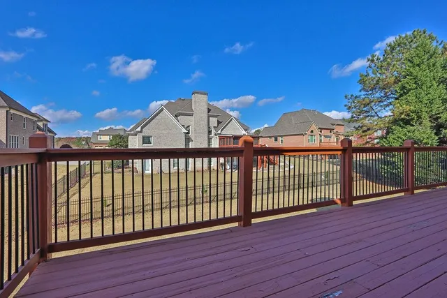 a view of a wooden street from a balcony