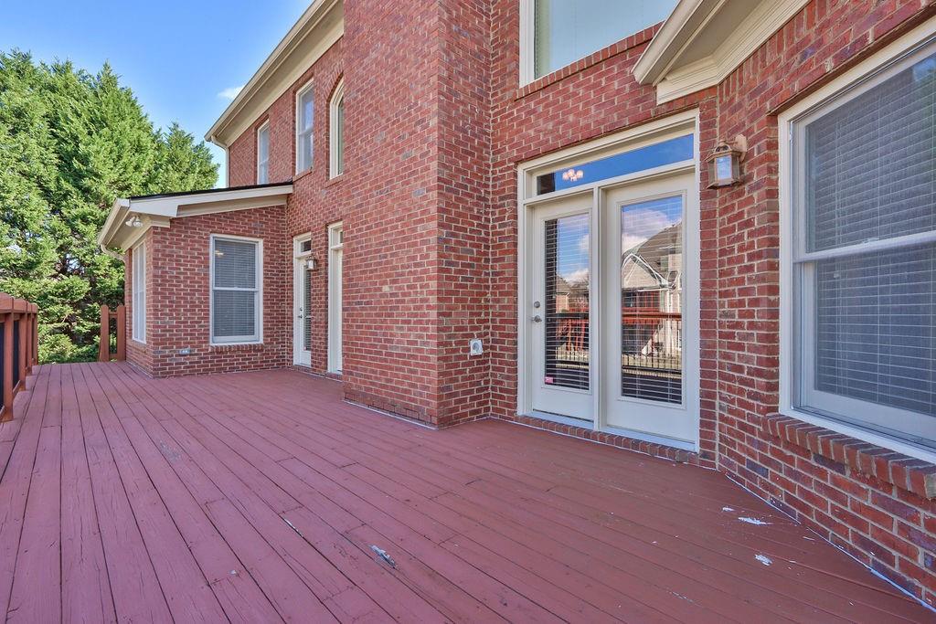 737 Heritage Post Lane Southwest Grayson, GA 30017 - Photo 44 of 50 front view of a house with an outdoor space