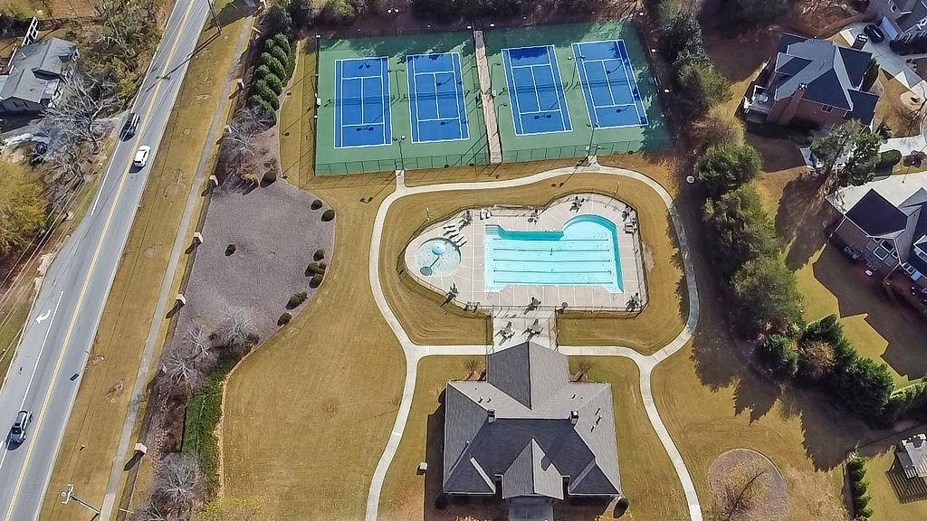 737 Heritage Post Lane Southwest Grayson, GA 30017 - Photo 50 of 50 an aerial view of a house with a swimming pool