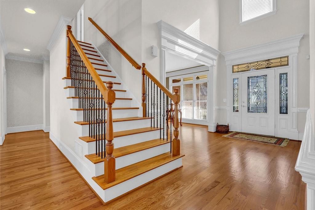 737 Heritage Post Lane Southwest Grayson, GA 30017 - Photo 5 of 50 a view of entryway with wooden floor and stairs