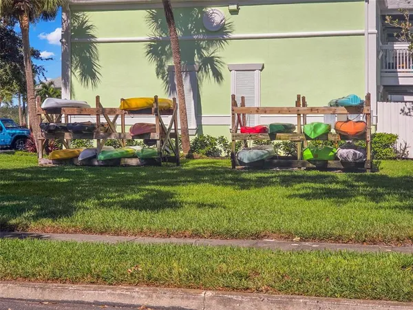 a view of multiple houses with a yard