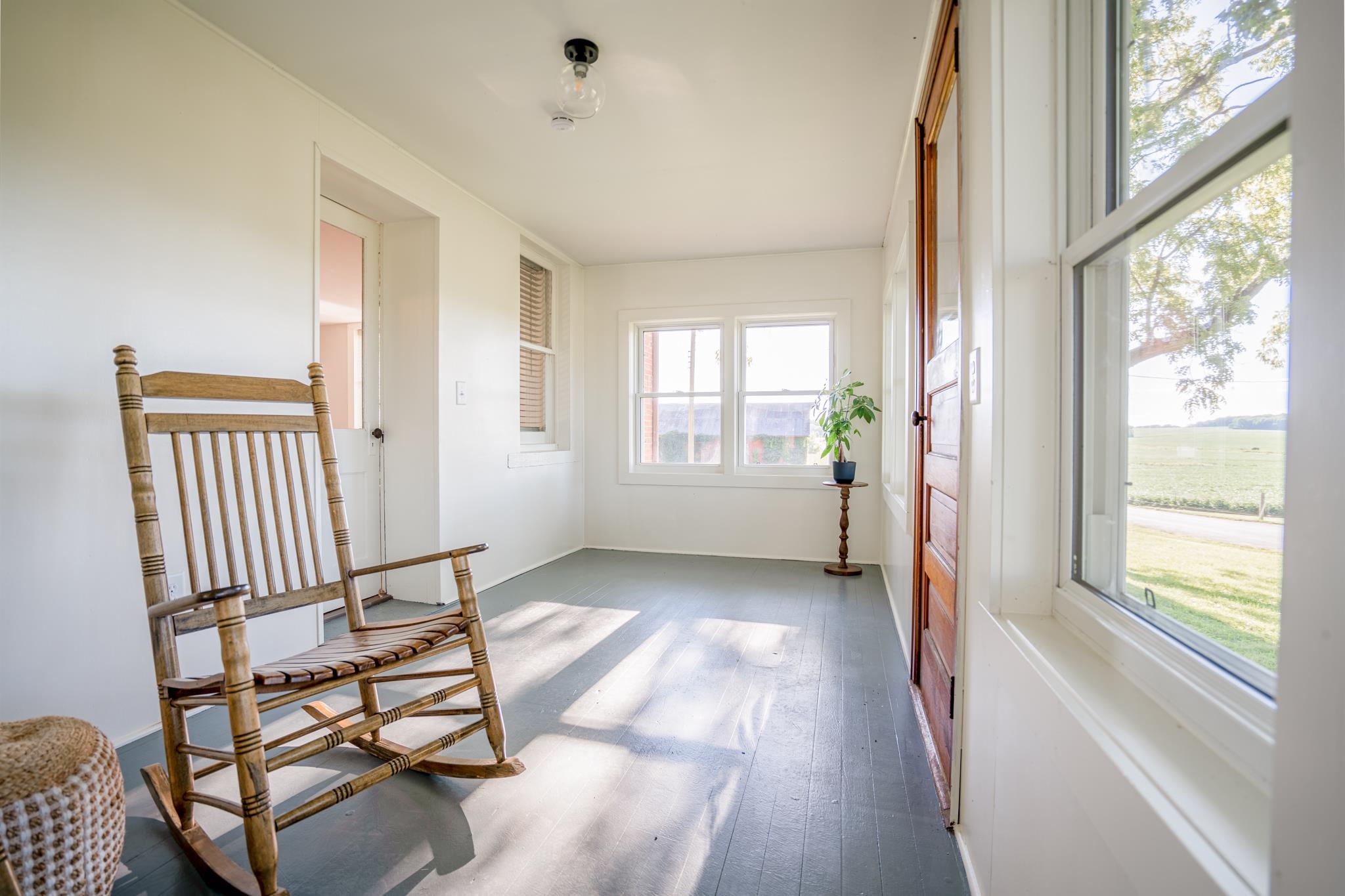 2368 West Winneshiek Road Freeport, IL 61032 - Photo 14 of 39 a view of a hallway with windows and stairs