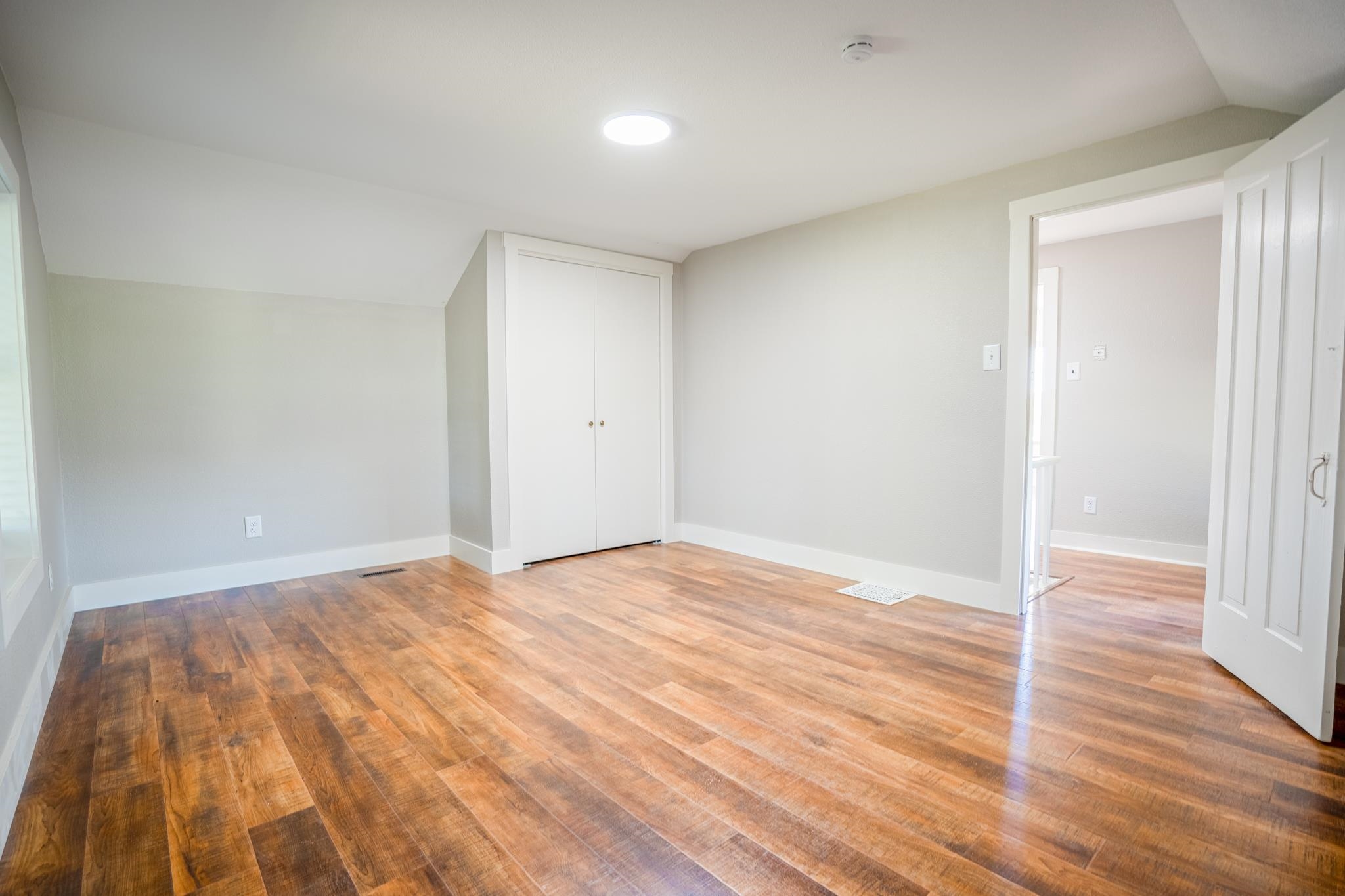 2368 West Winneshiek Road Freeport, IL 61032 - Photo 23 of 39 a view of empty room with wooden floor