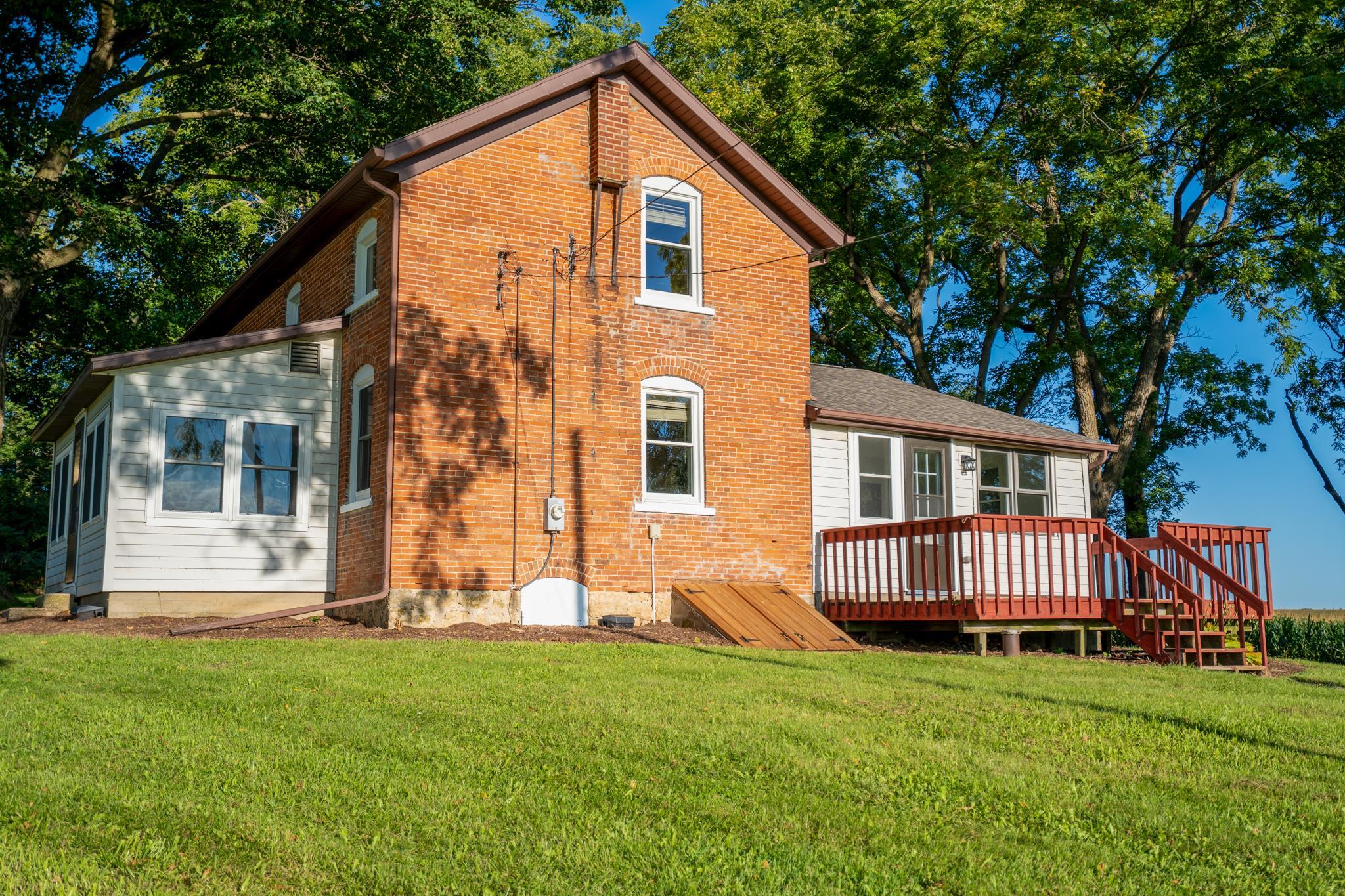 2368 West Winneshiek Road Freeport, IL 61032 - Photo 30 of 39 a front view of a house with a garden