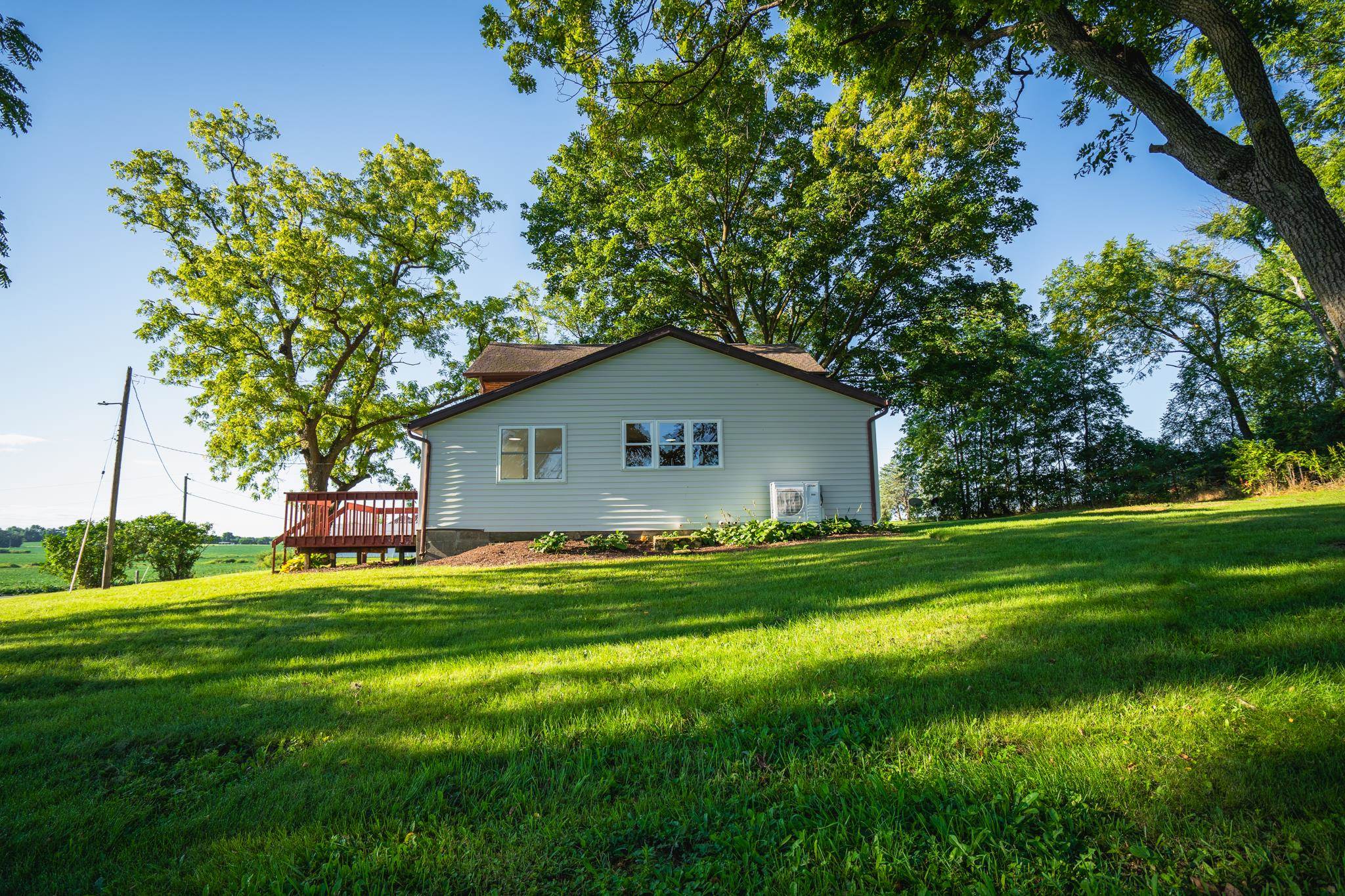 2368 West Winneshiek Road Freeport, IL 61032 - Photo 31 of 39 a backyard of a house with table and chairs
