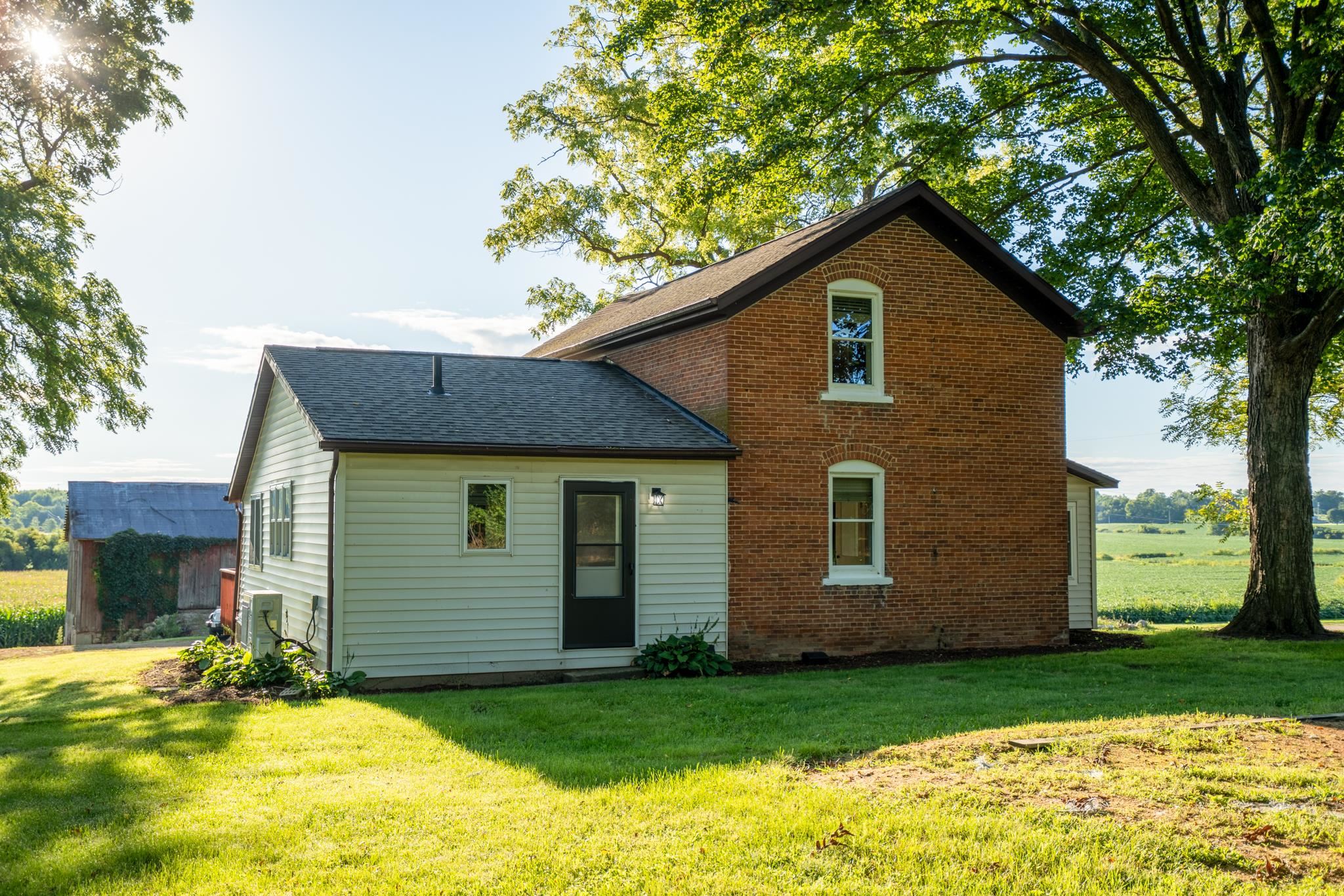 2368 West Winneshiek Road Freeport, IL 61032 - Photo 32 of 39 a front view of a house with a yard