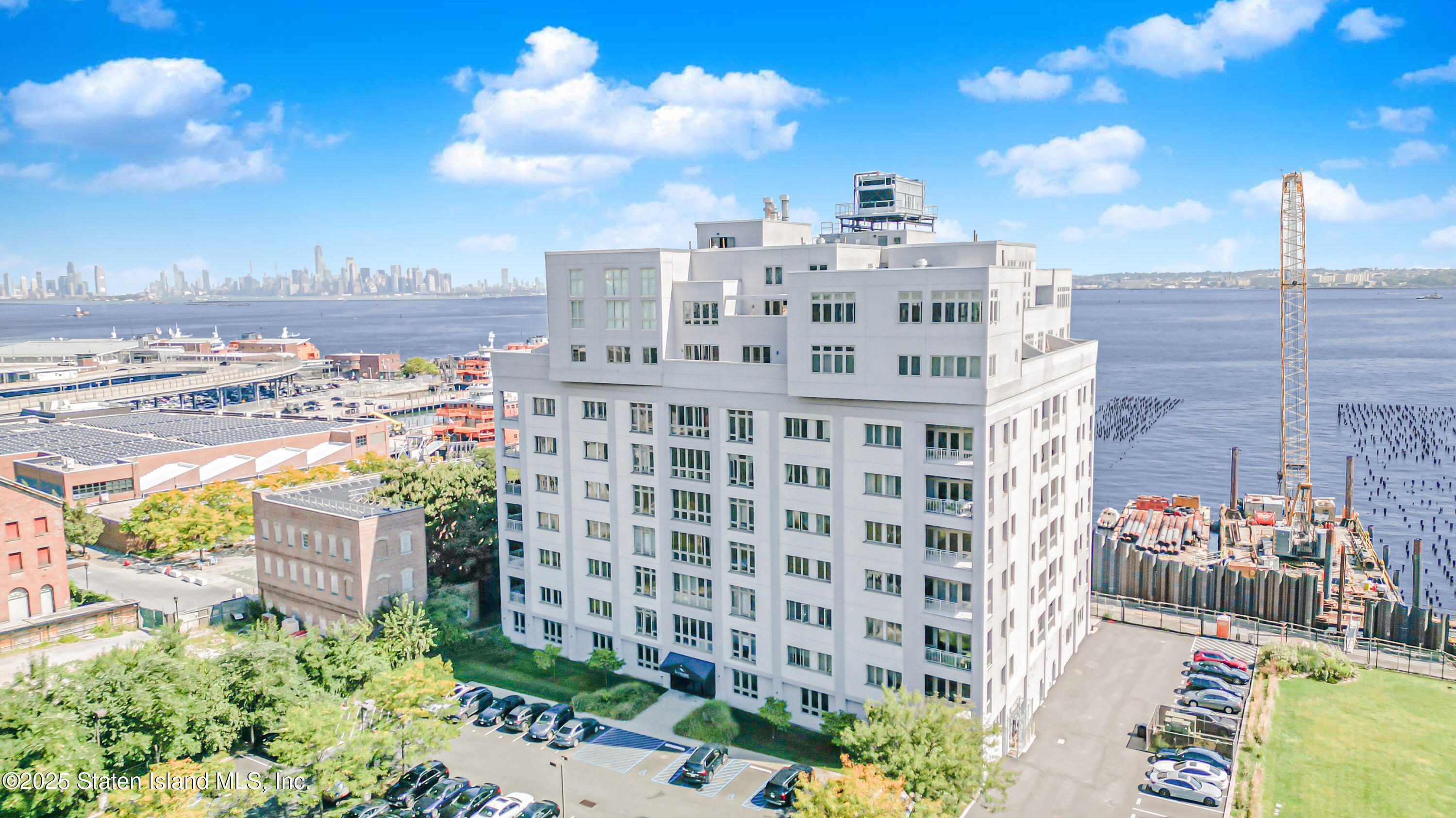 90 Bay Street Landing, Unit 1E Staten Island, NY 10301 - Photo 1 of 43 a view of a city with tall buildings