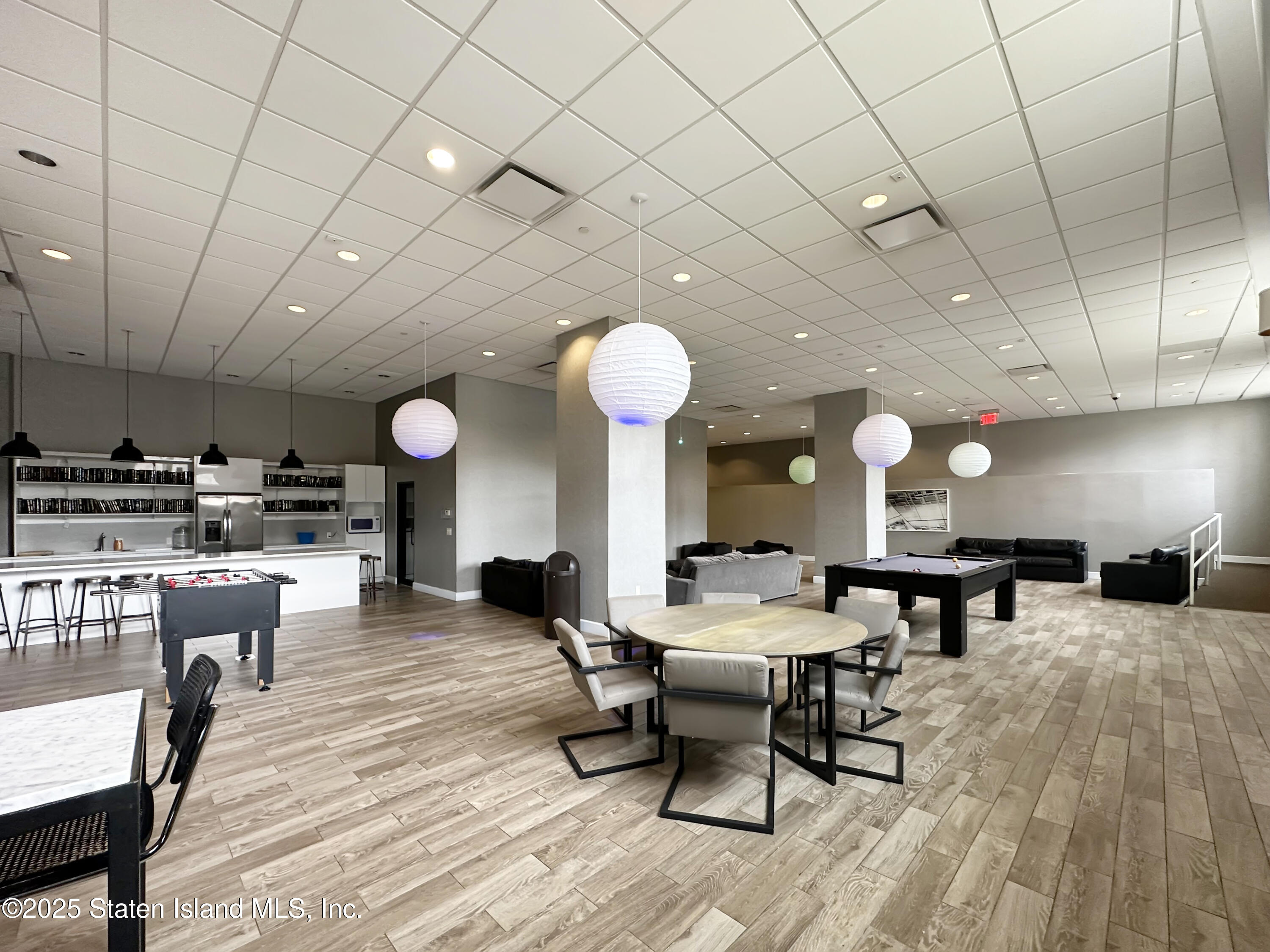 90 Bay Street Landing, Unit 1E Staten Island, NY 10301 - Photo 32 of 43 a view of a dining room with furniture